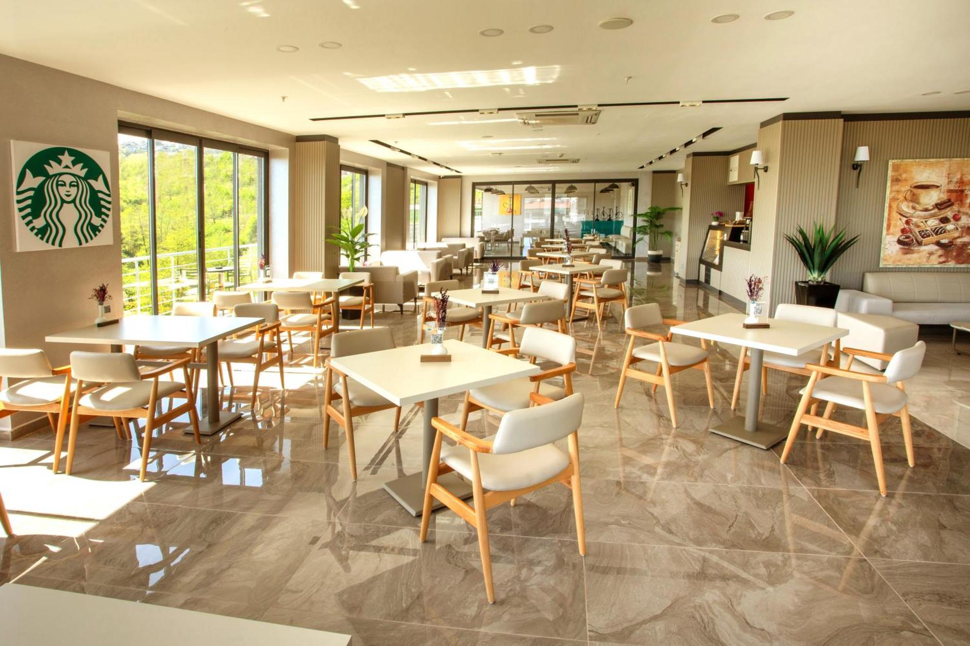 First Joy Hotel ทรับซอน ภายนอก รูปภาพ